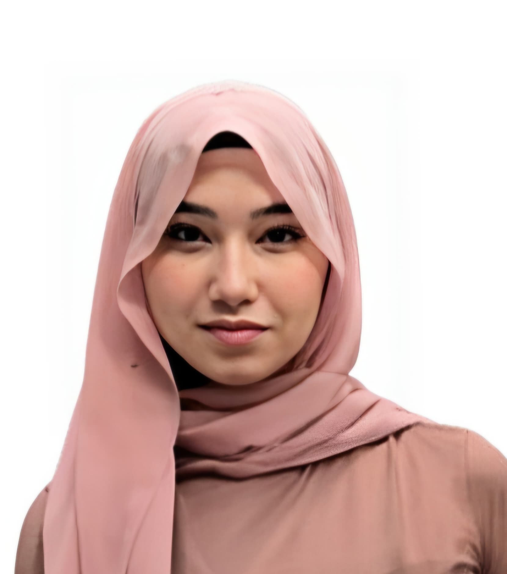 Young woman in a light pink hijab looking directly at the viewer with a soft expression.